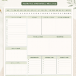 Un planner ouvert sur une table avec des stylos, symbolisant l'organisation quotidienne.
